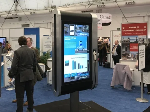 Historical ReCharged Smart-Hub prototype displaying an interactive interface in a public exhibition setting